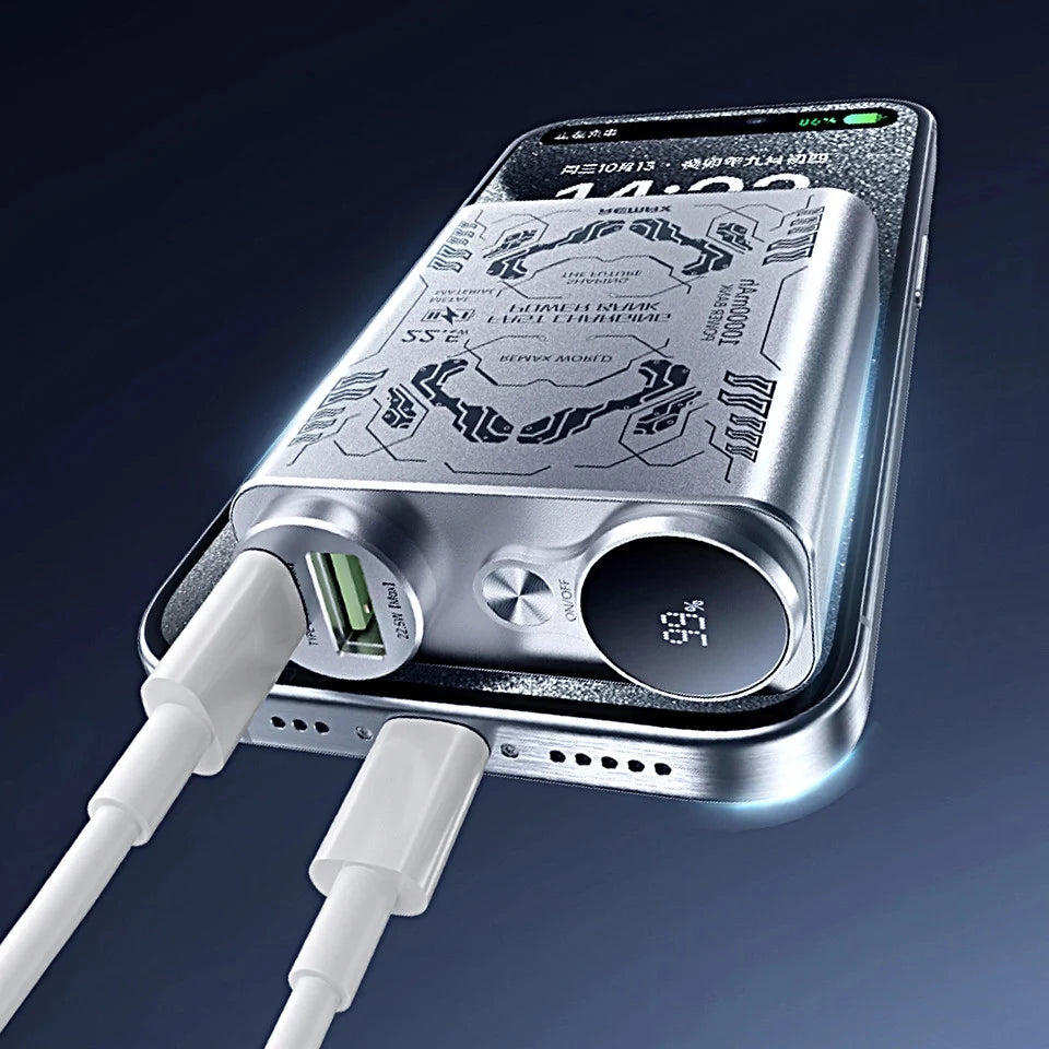Silver electronic device with USB cable on a dark background