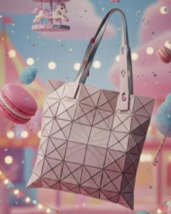Geometric patterned handbag on a colorful background with macarons and a carousel.