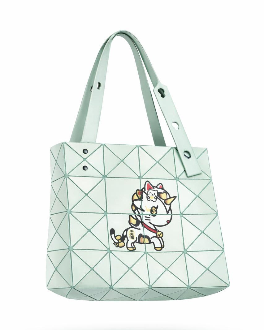 Mint green geometric handbag with a cartoon cat design on a white background